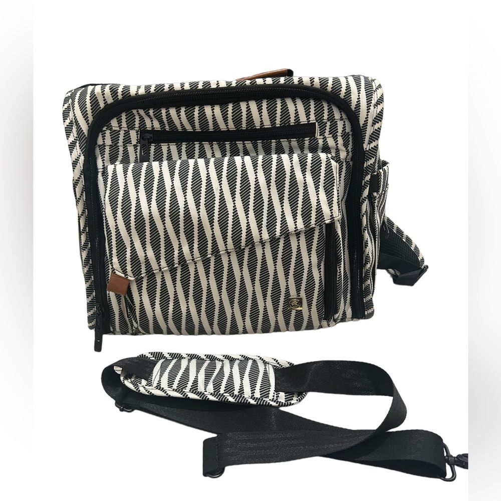Diaper backpack with crossbody strap.